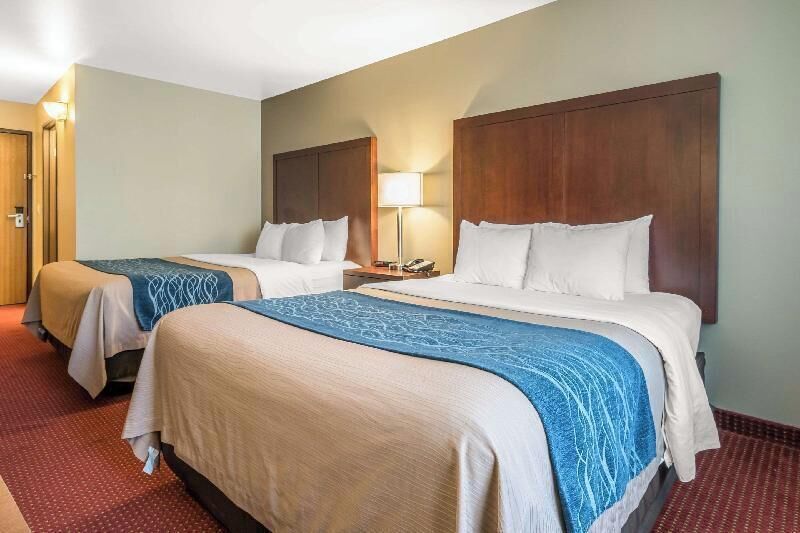 Pillowtop beds, desk, blackout drapes, iron/ironing board