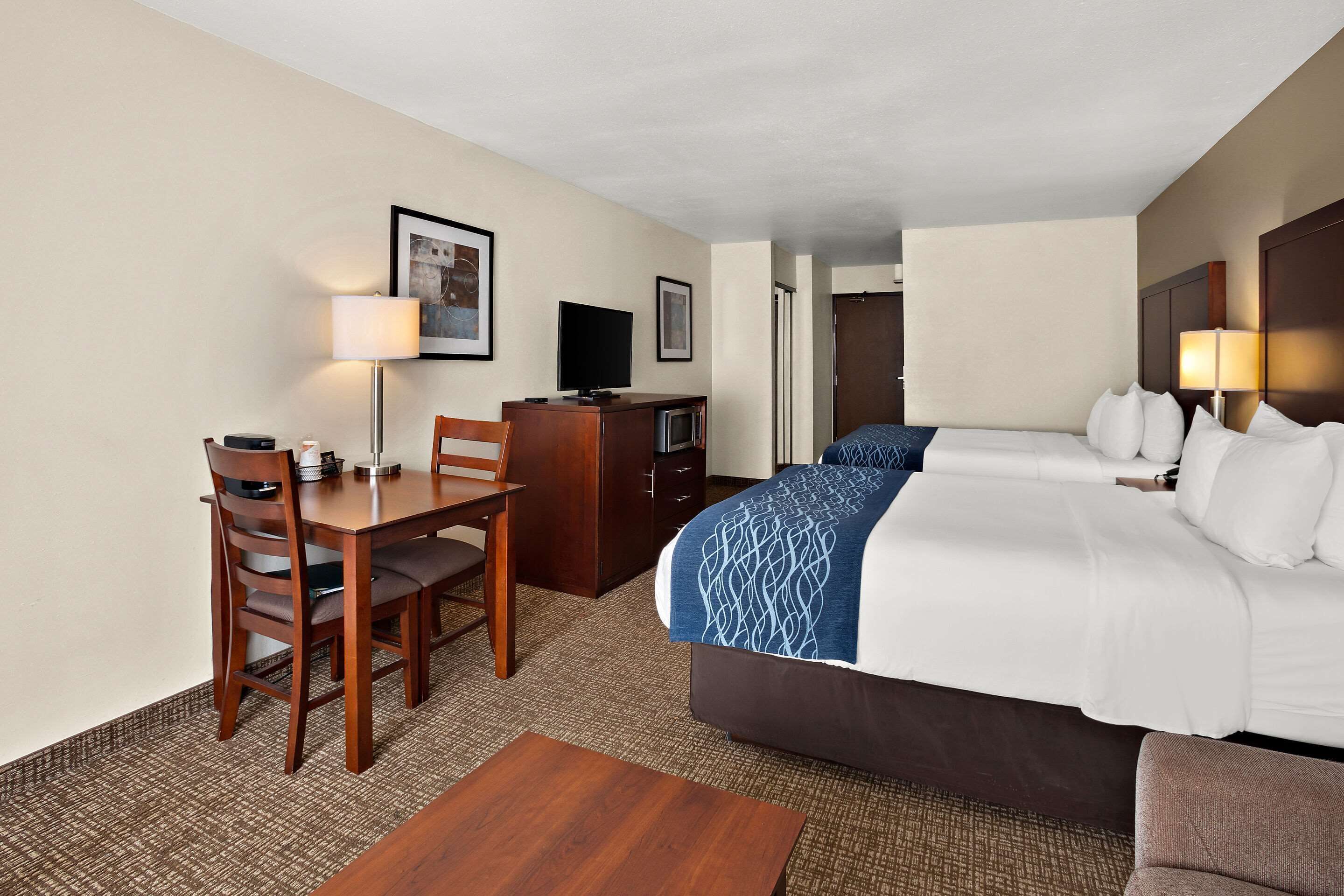 suite, multiple beds | pillow-top beds, desk, blackout curtains, iron/ironing board