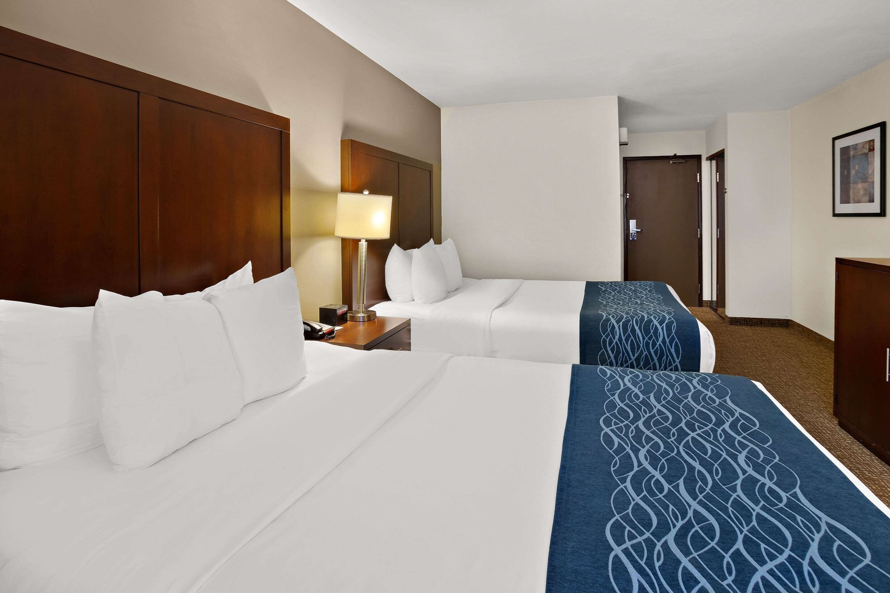 standard room, 2 queen beds, non smoking | pillow-top beds, desk, blackout curtains, iron/ironing board