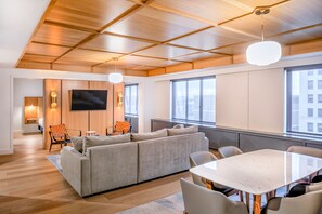 32-inch TV with cable channels, pay films