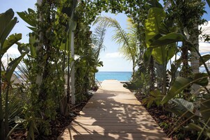 Private beach, white sand, beach cabanas, sun loungers