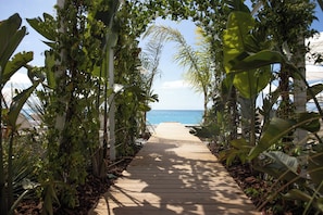 Private beach, white sand, beach cabanas, sun-loungers