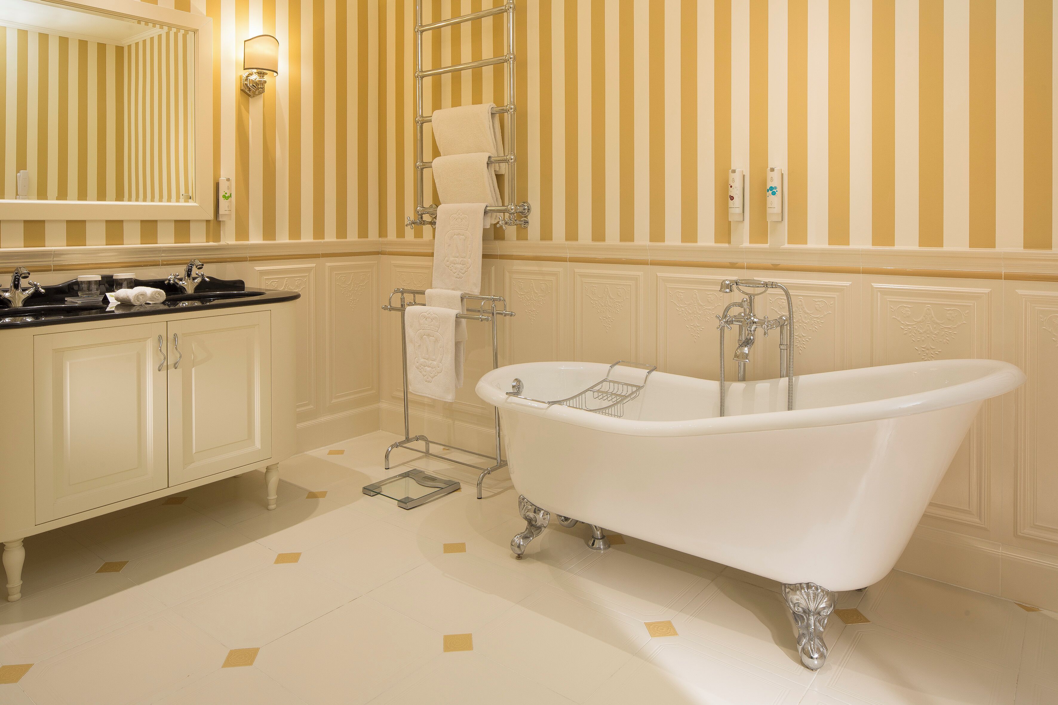 Deluxe Family Room, Courtyard View | Bathroom | Designer toiletries, hair dryer, bathrobes, slippers