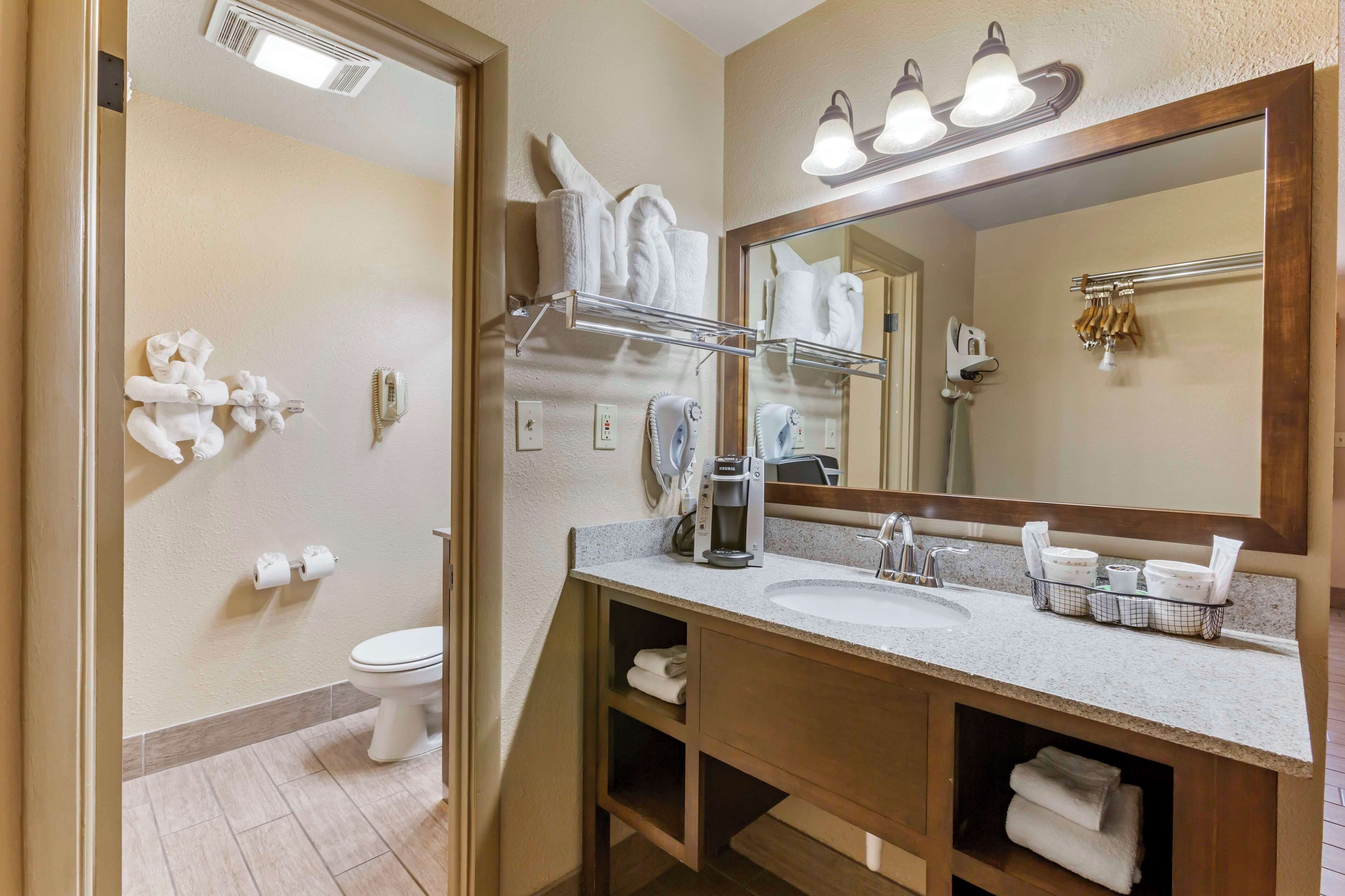 standard room, 2 queen beds, non smoking, refrigerator & microwave (pet friendly) | bathroom | free toiletries, hair dryer, towels, soap