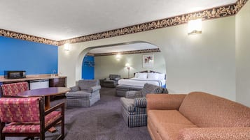 Luxury Suite, 1 King Bed, Non Smoking | 1 bedroom, premium bedding, desk, laptop workspace
