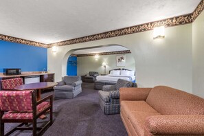 Luxury Suite, 1 King Bed, Non Smoking | Premium bedding, desk, laptop workspace, blackout drapes