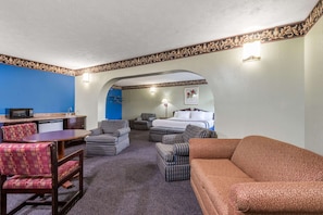 Luxury Suite, 1 King Bed, Non Smoking | 1 bedroom, premium bedding, desk, laptop workspace