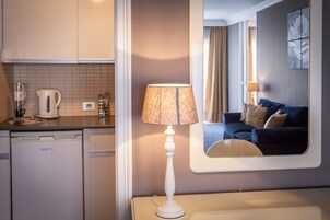 Junior Suite | 1 bedroom, blackout drapes, free WiFi, bed sheets