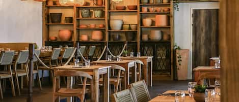 Lunch, dinner served; French cuisine, pool views