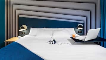 Premium bedding, desk, blackout drapes, soundproofing