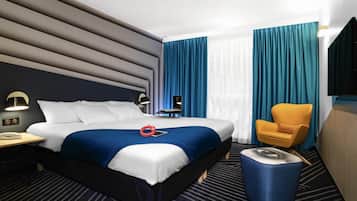 Premium bedding, desk, blackout drapes, soundproofing