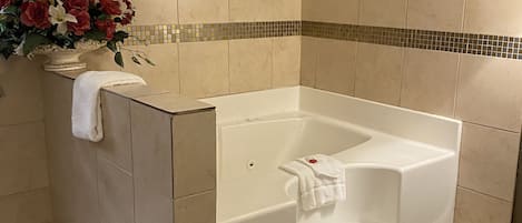 Desk, laptop workspace, iron/ironing board, free cribs/infant beds