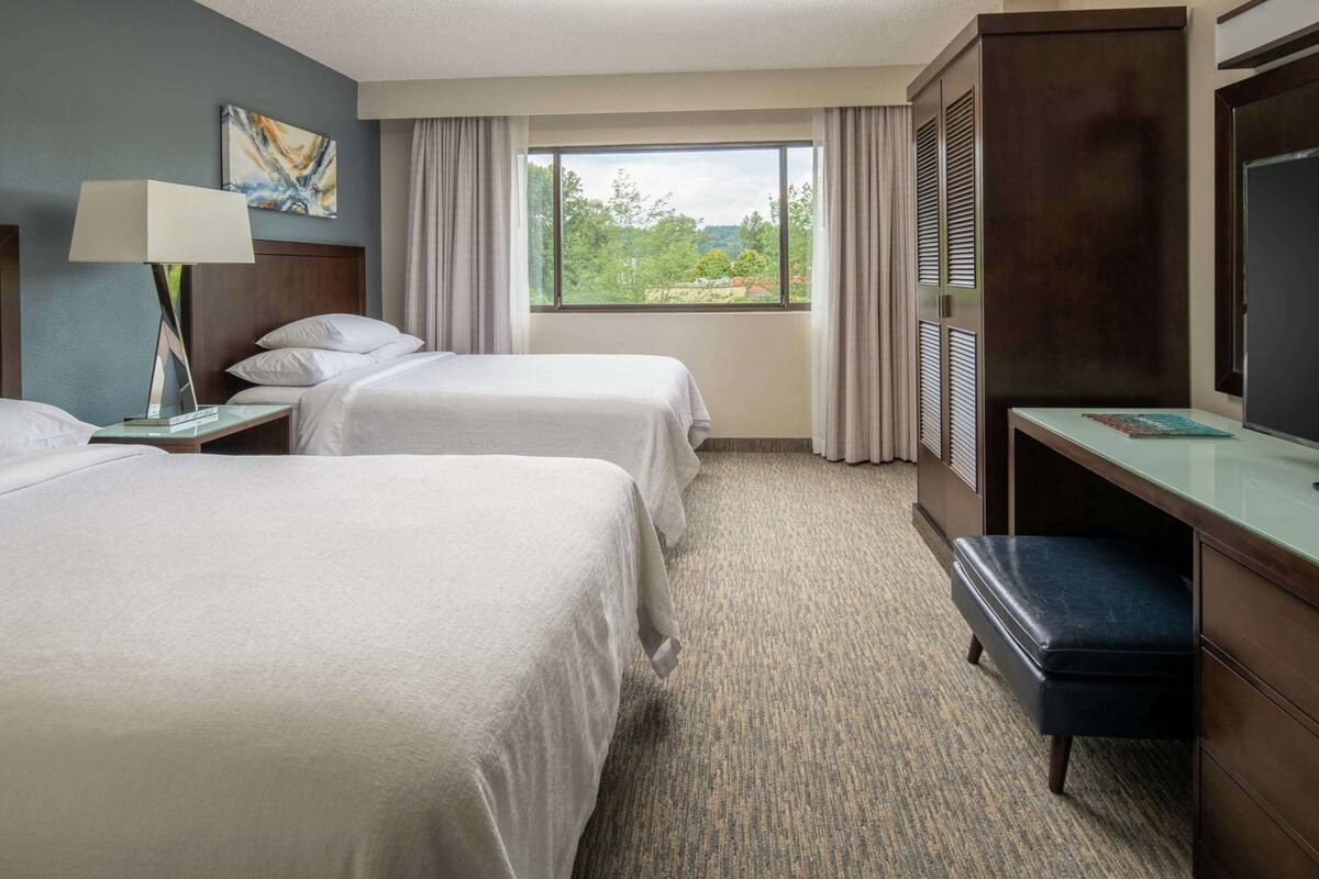 Premium bedding, down comforters, pillowtop beds, in-room safe