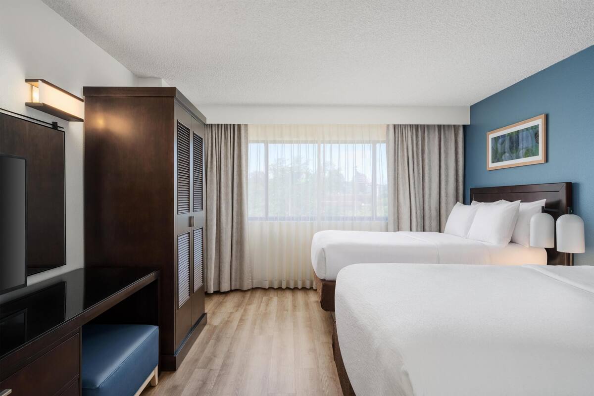 Premium bedding, down duvets, pillow-top beds, in-room safe