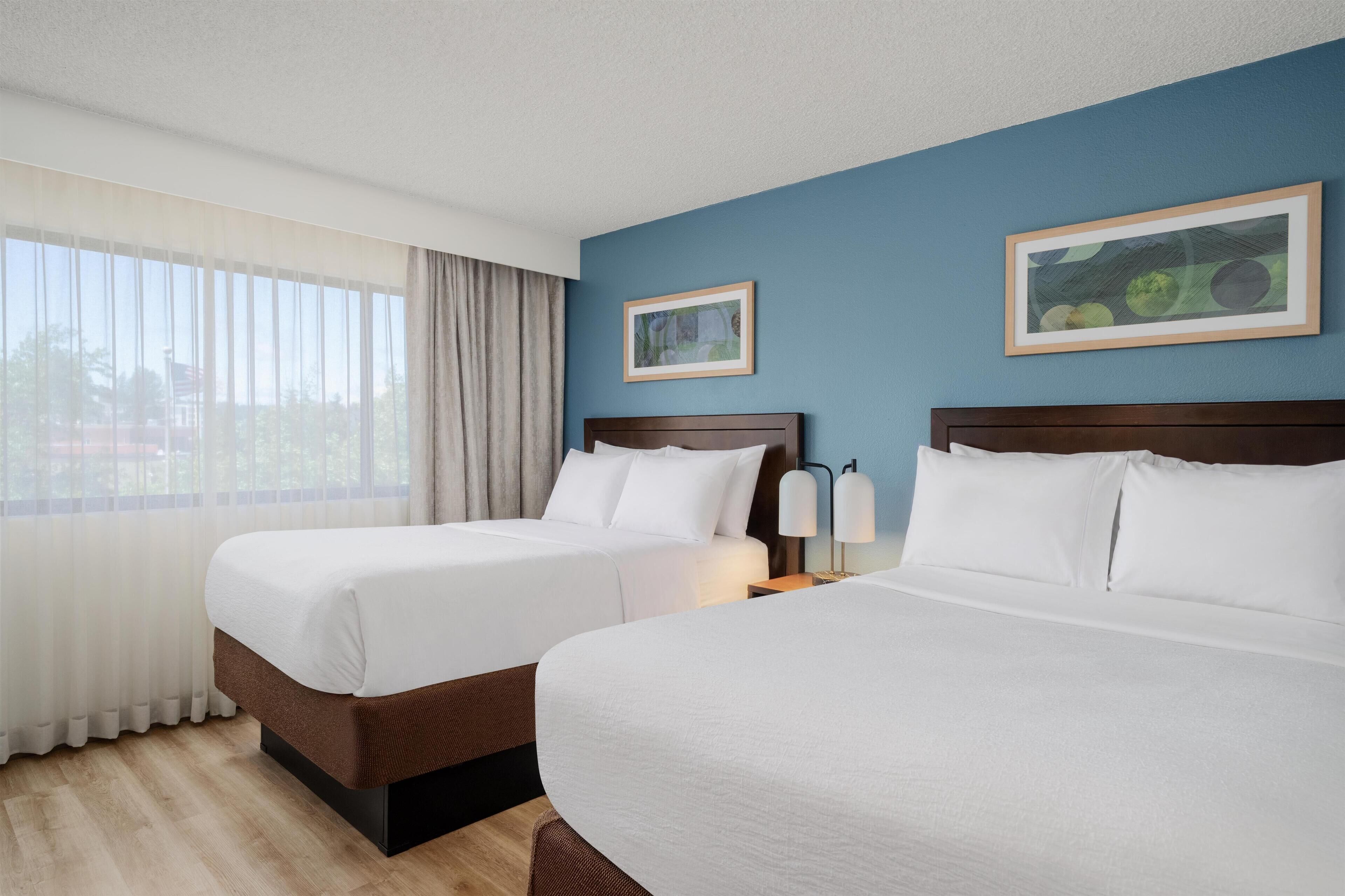 Premium bedding, down comforters, pillowtop beds, in-room safe
