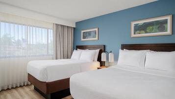 Premium bedding, down comforters, pillowtop beds, in-room safe