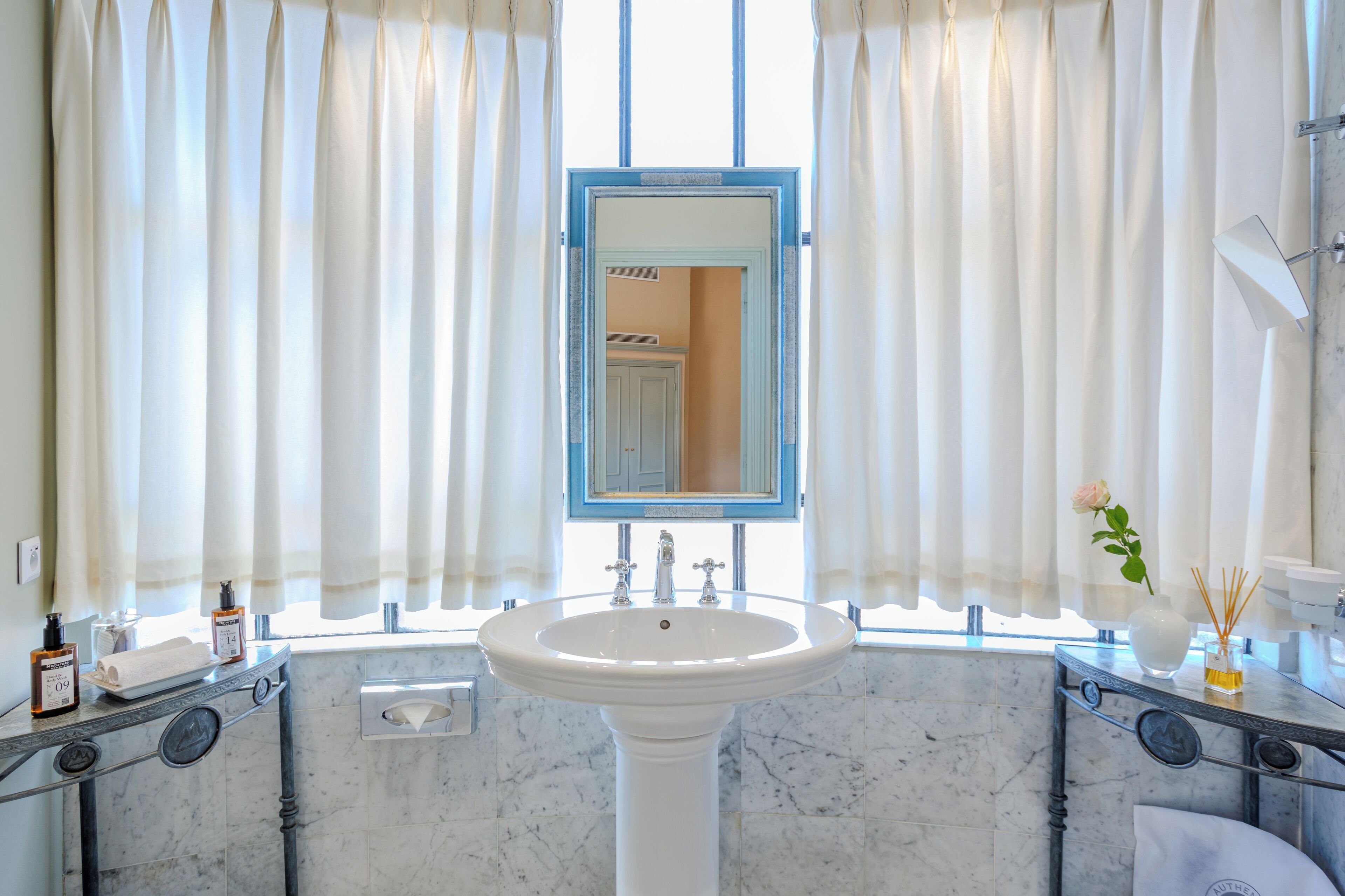rotunda room (free wine tasting) | bathroom | designer toiletries, hair dryer, towels, soap