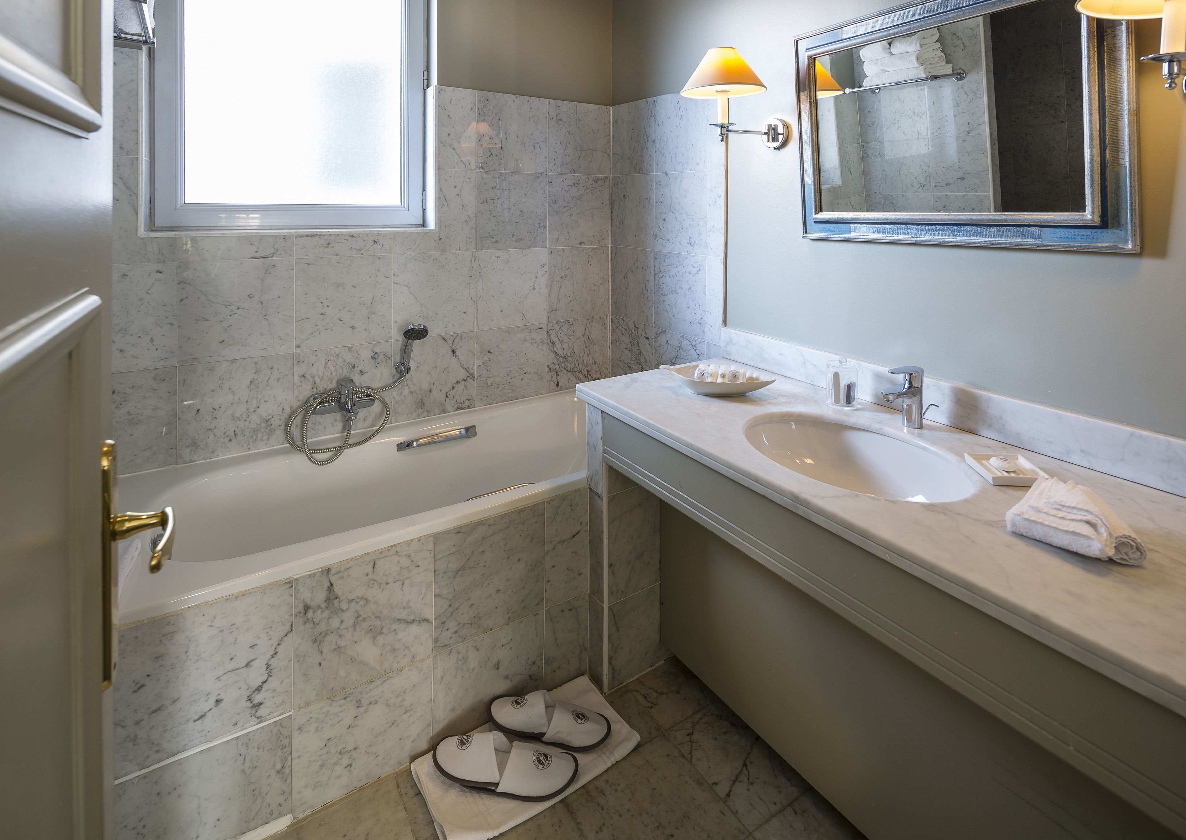 deluxe room (free wine tasting) | bathroom | designer toiletries, hair dryer, towels, soap