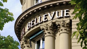 A building facade with the word "BELLEVUE" prominently displayed.