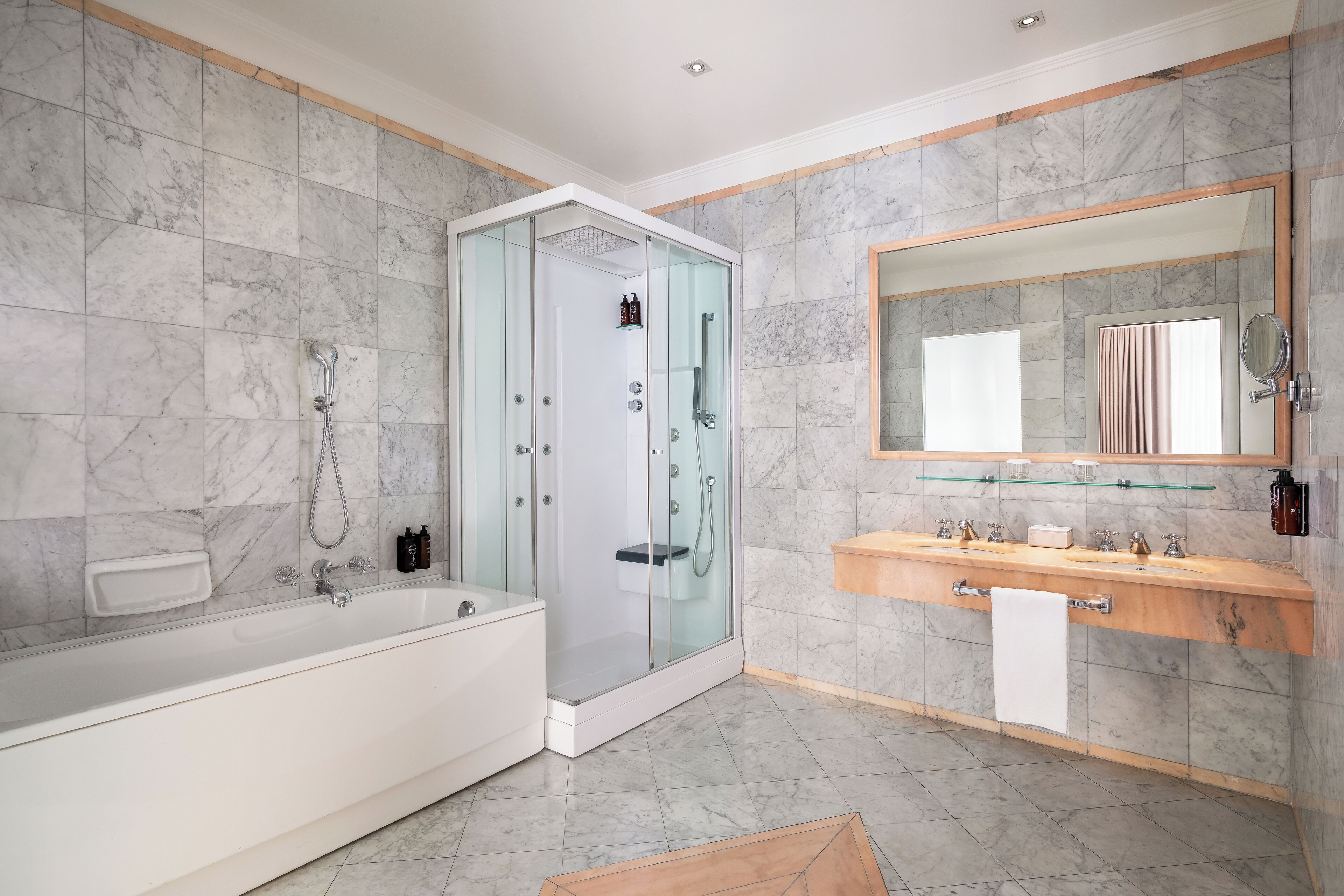 deluxe suite | bathroom | bathrobes, slippers, bidet, towels