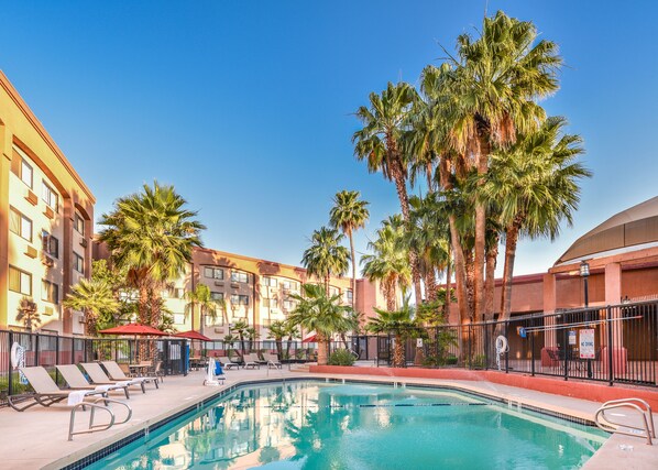 Outdoor pool, open 7:00 AM to 10 PM, pool umbrellas, sun loungers