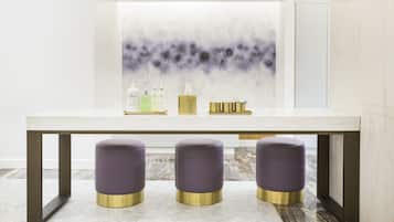 Simple, modern space with a clean table and stylish stools.