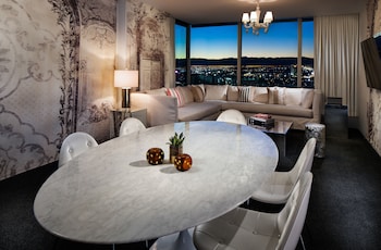 ALEXANDRIA ULTRA SUITE | Living area | 55-inch flat-screen TV with satellite channels, TV at SAHARA Las Vegas