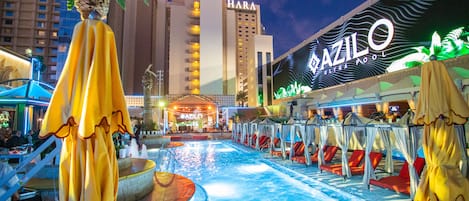 Seasonal outdoor pool, cabanas (surcharge), pool umbrellas