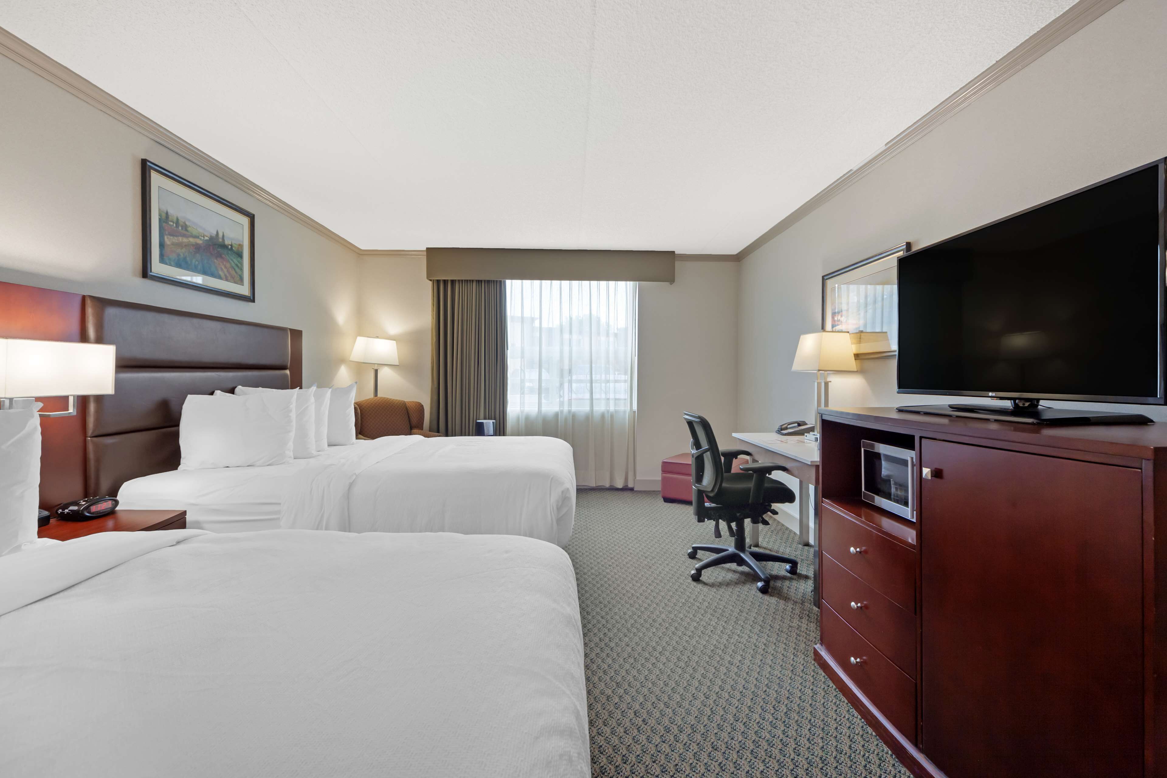 standard room, 2 queen beds, non smoking, fireplace | premium bedding, desk, iron/ironing board, free wifi