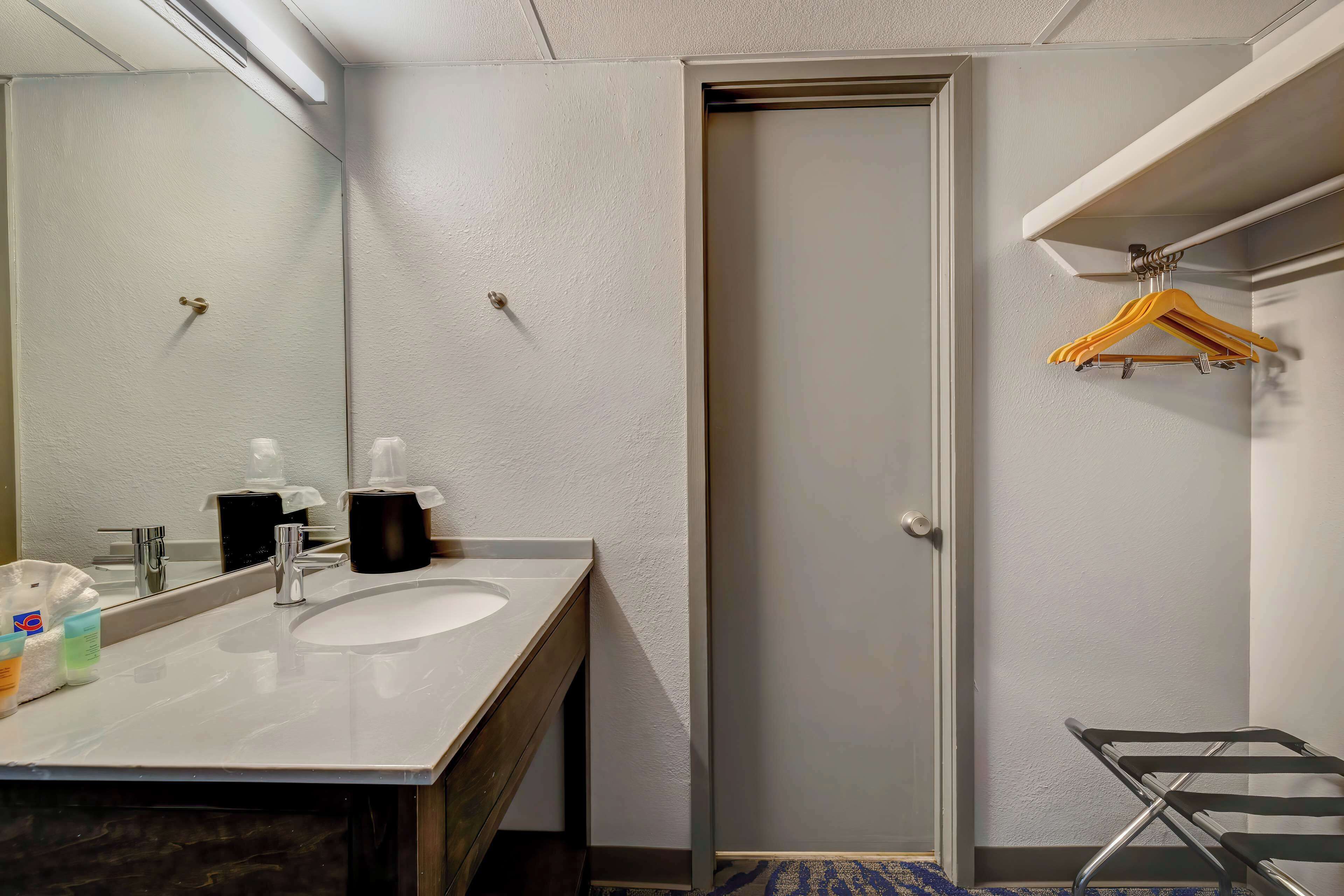 Desk, laptop workspace, blackout curtains, iron/ironing board