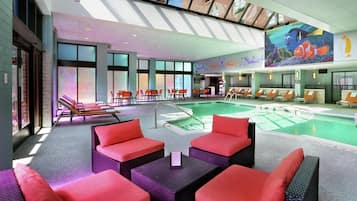 Indoor pool, open 6:00 AM to 10:00 PM, pool loungers
