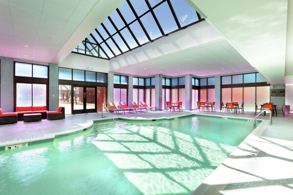 Indoor pool, open 6:00 AM to 10:00 PM, pool loungers