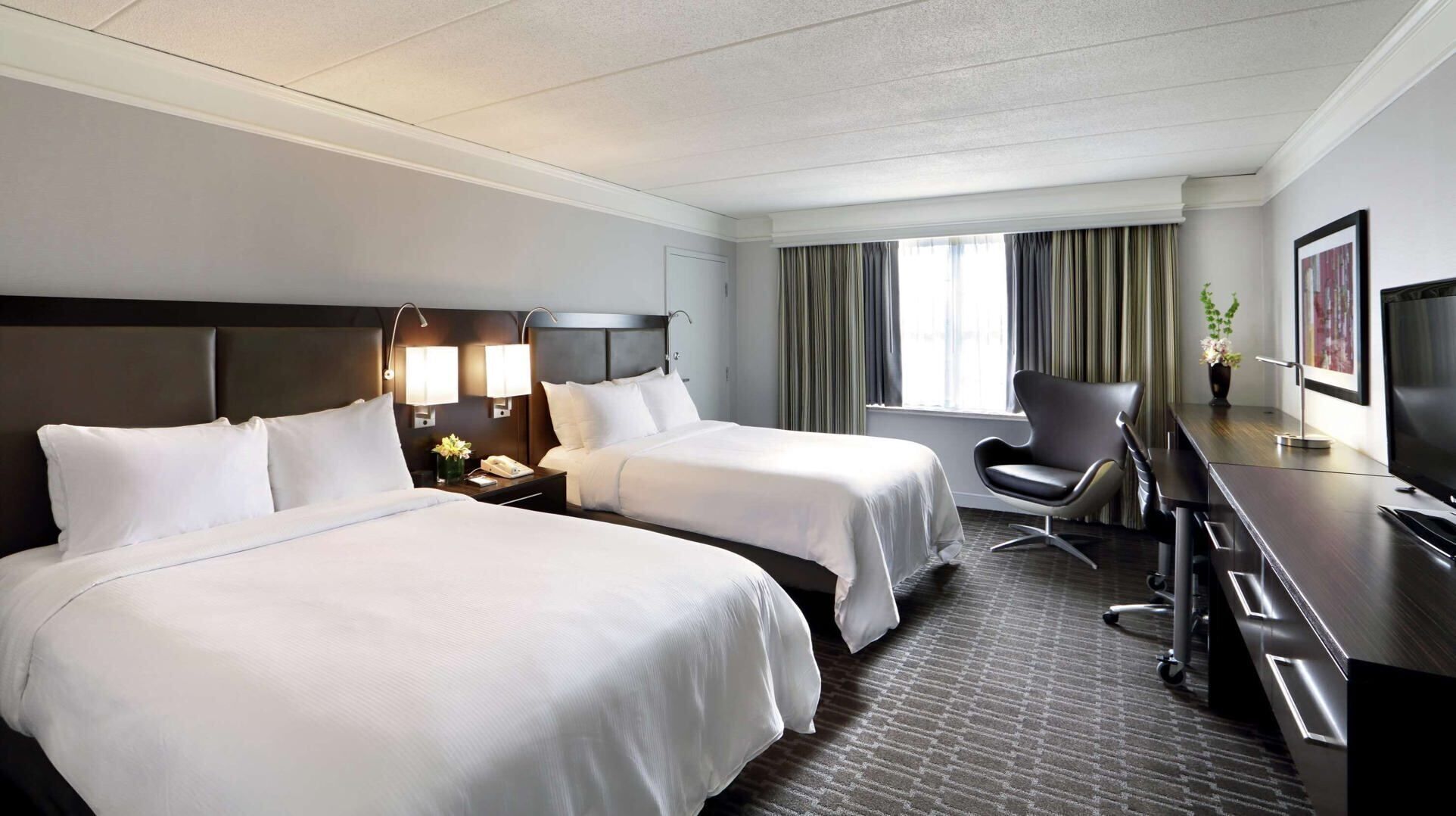 Premium bedding, down comforters, pillowtop beds, in-room safe