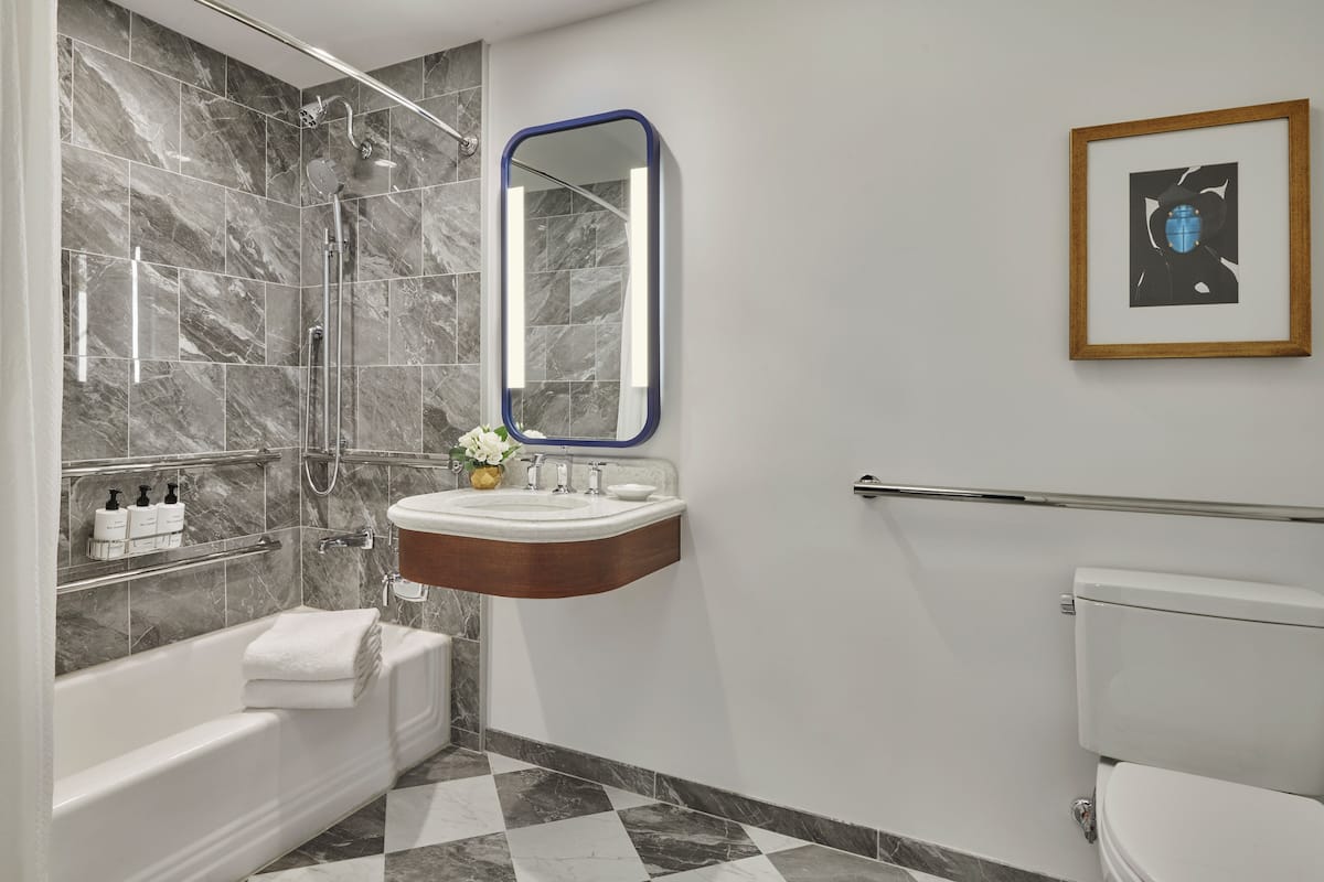 Combined shower/bathtub, free toiletries, hair dryer, bathrobes