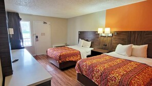 Hypo-allergenic bedding, desk, laptop workspace, blackout drapes