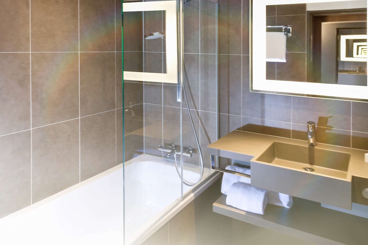 eco-friendly toiletries, hair dryer, towels