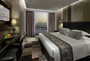 Quarto premium | Frigobar, cofres nos quartos, individualmente mobiliados