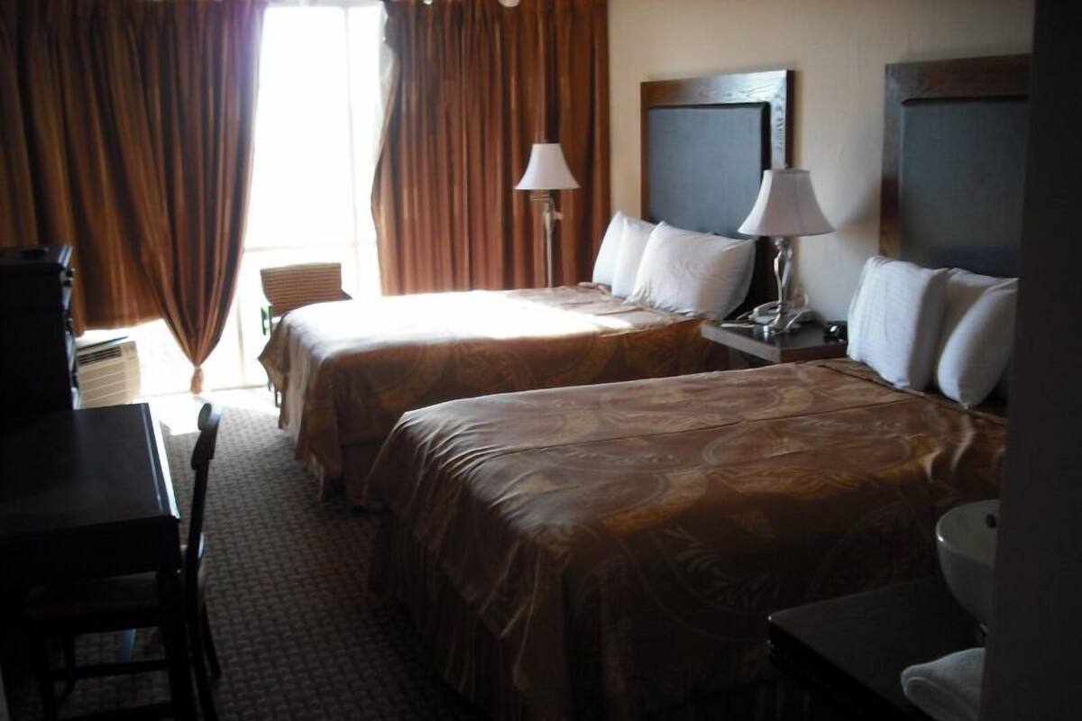 Premium bedding, desk, blackout drapes