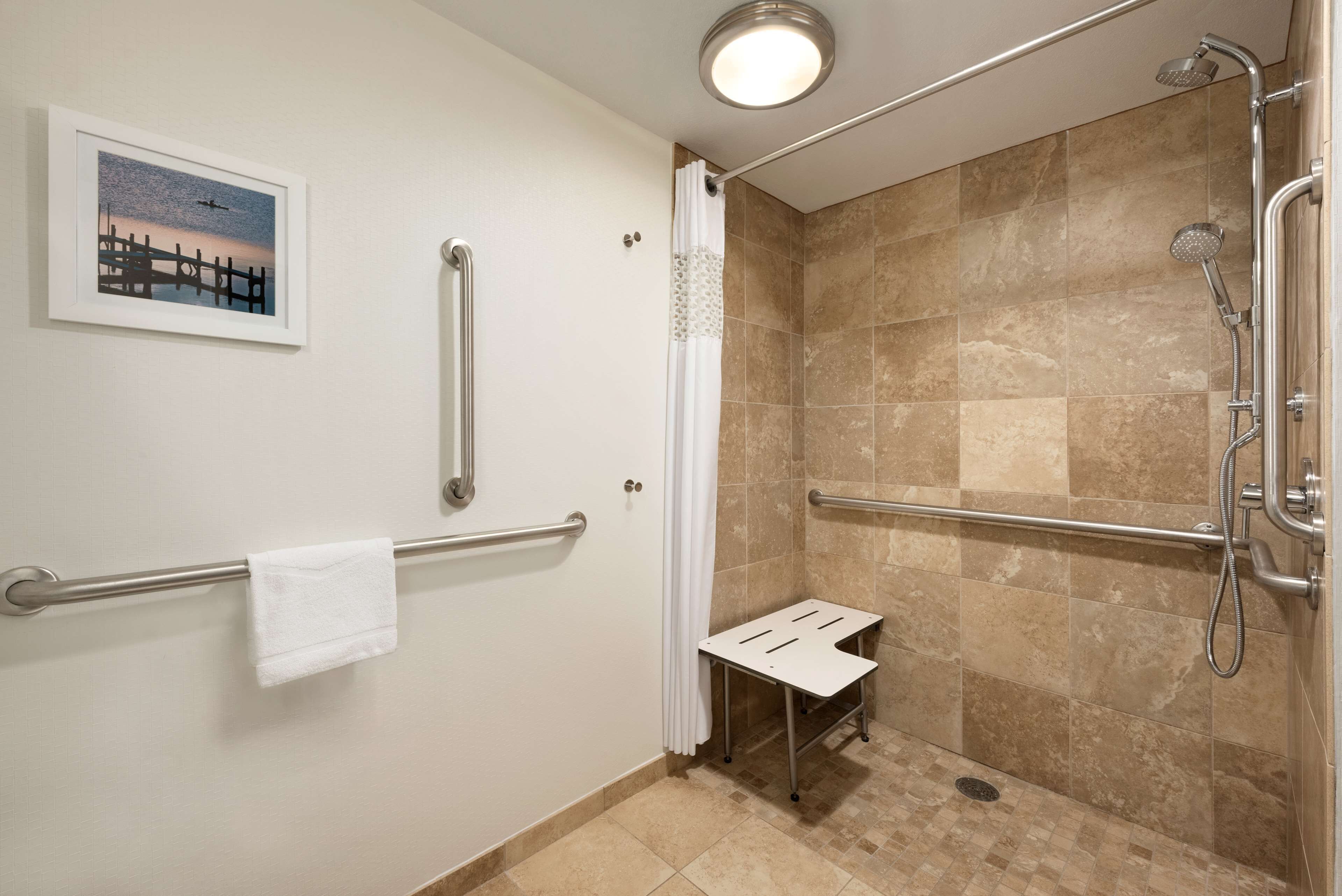 room, 1 queen bed (roll-in shower) | bathroom | free toiletries, hair dryer, towels, soap