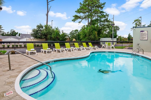 Seasonal outdoor pool, open 9:00 AM to 10:00 PM, sun loungers