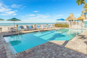 Outdoor pool, pool umbrellas, sun loungers