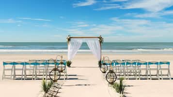 On the beach, beach towels, beach volleyball, beach bar