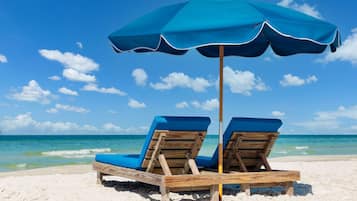 On the beach, beach towels, beach volleyball, beach bar