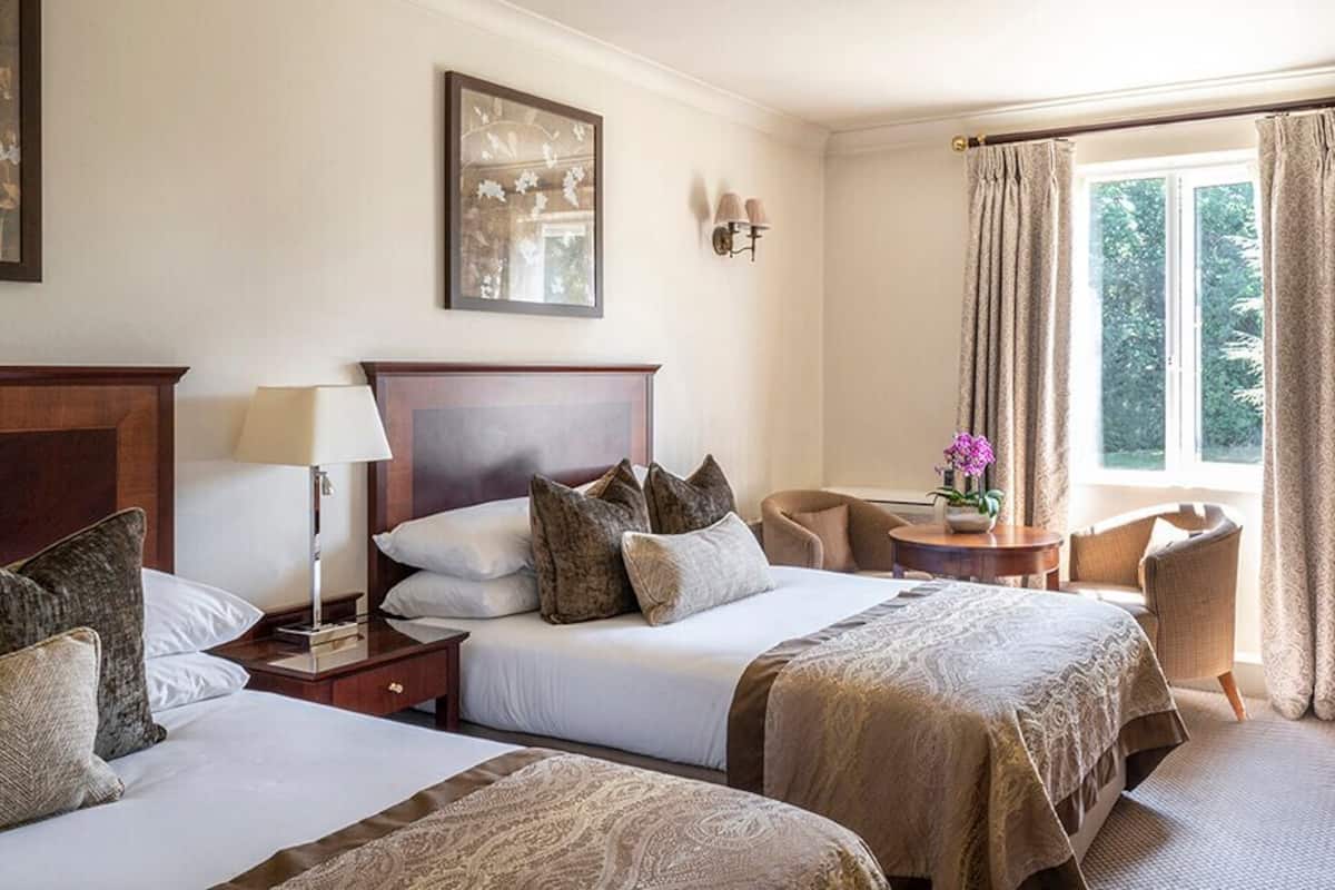 Executive Double Room | 1 bedroom, in-room safe, individually decorated, individually furnished