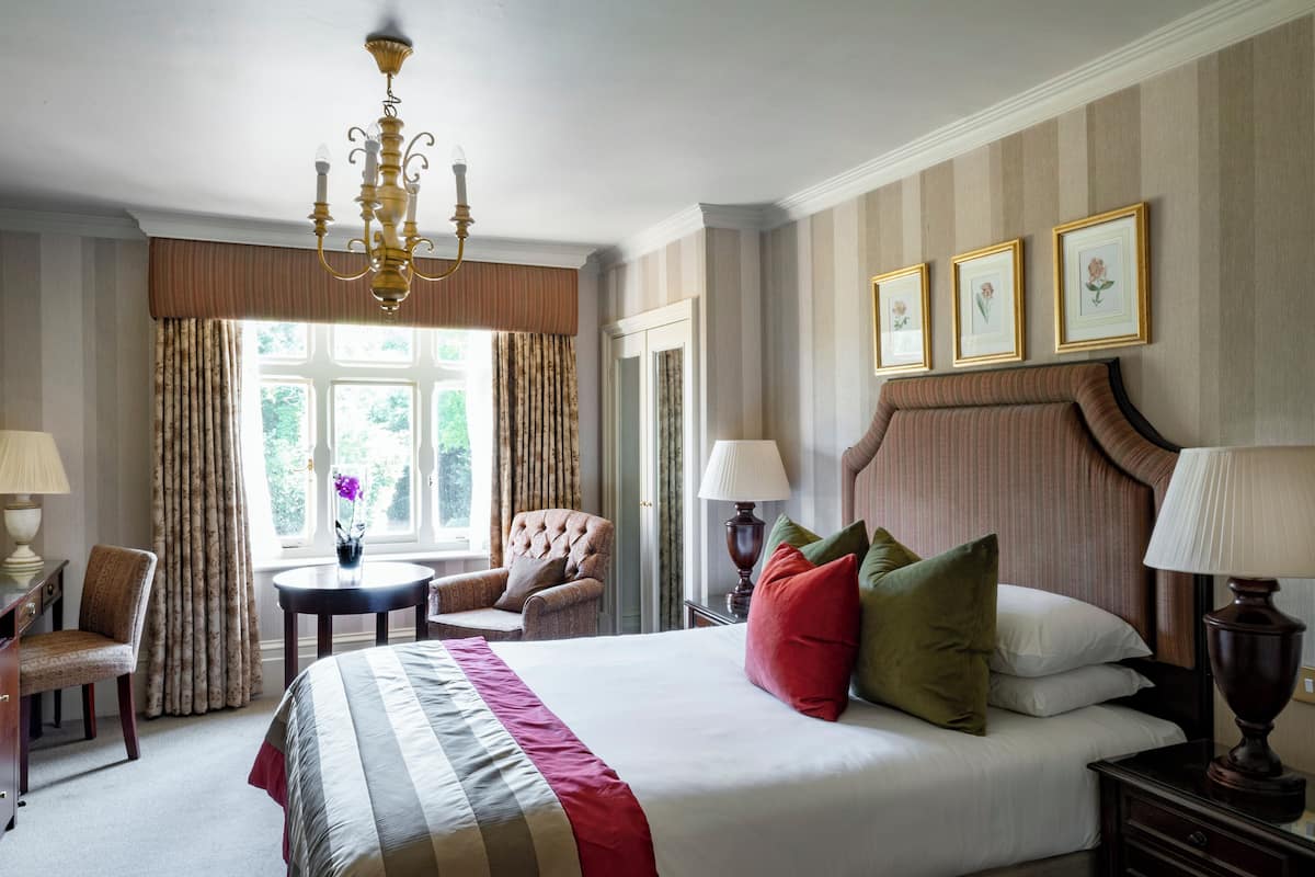 deluxe double room | in-room safe, individually decorated, individually furnished, desk