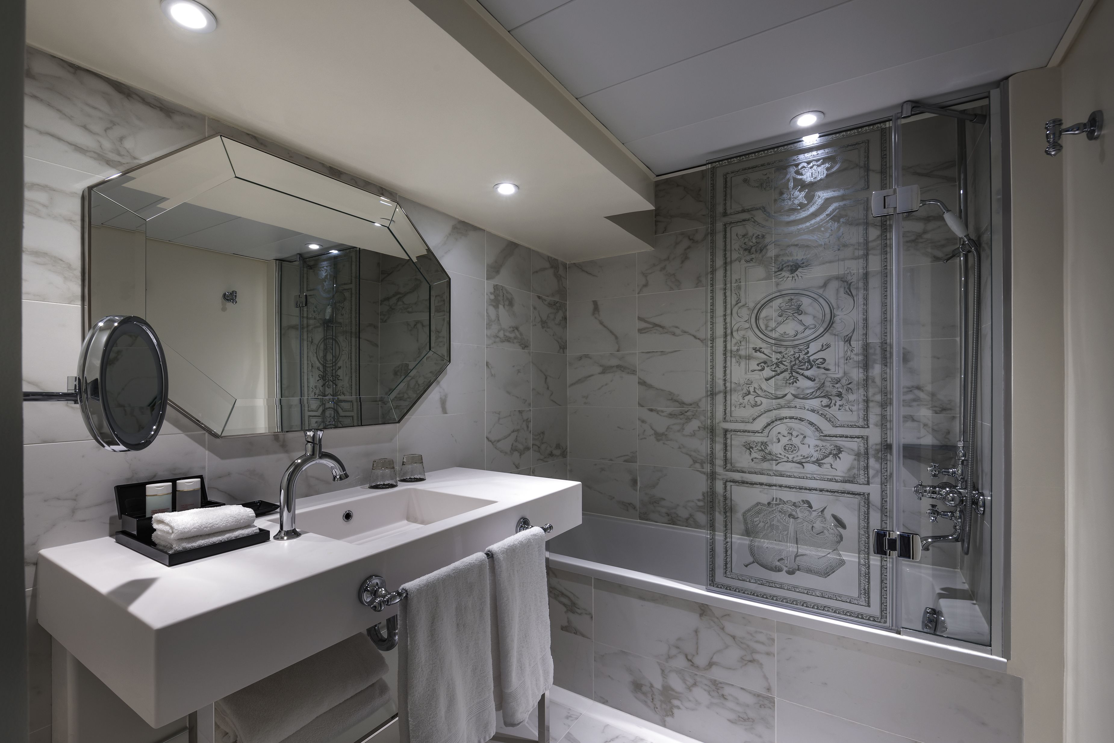 combined shower/bathtub, eco-friendly toiletries, hair dryer, bathrobes