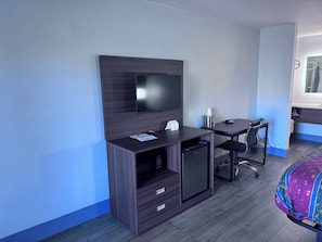 Tabla de planchar con plancha, wifi gratis y ropa de cama