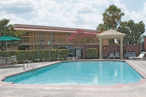 Outdoor pool, pool umbrellas, sun loungers