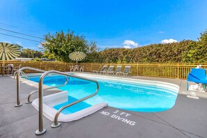 Seasonal outdoor pool, pool umbrellas