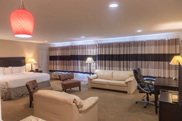 King Suite - Non-Smoking | Pillow-top beds, desk, blackout curtains, iron/ironing board